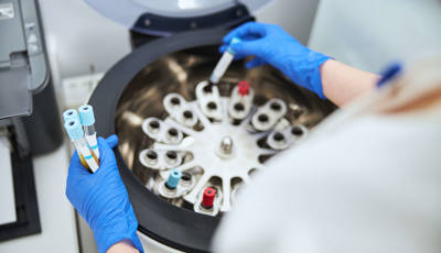 Biochemist Placing Vacutainers With Sodium Citrate